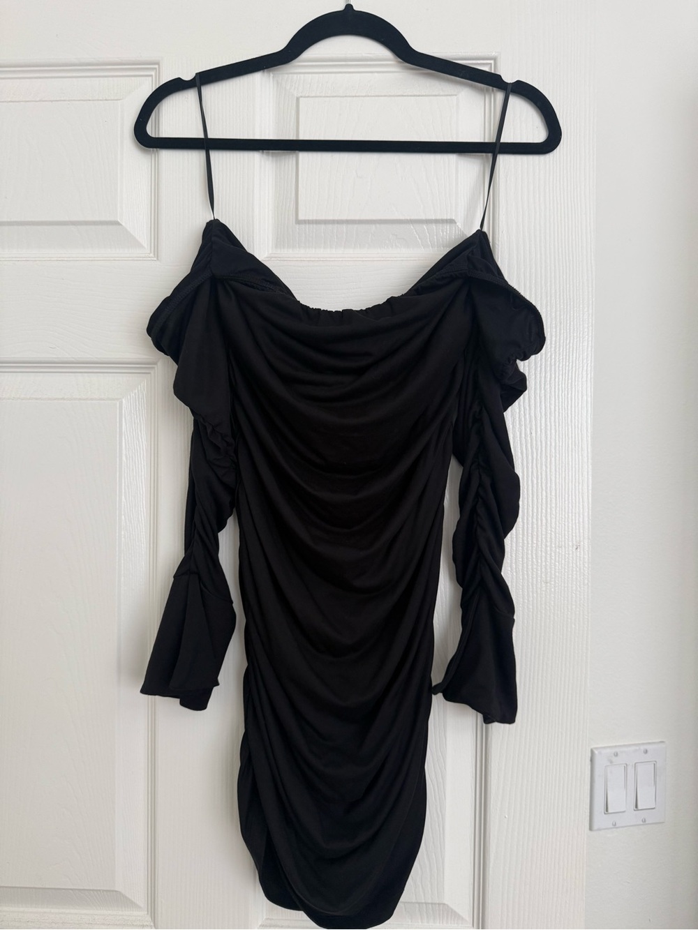 Black off the shoulder mini dress with ruching